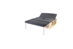 CampBoks® Pro 2.0 als ausgeklapptes Bett mit grauen Polstern und angehobener Kopfstütze.